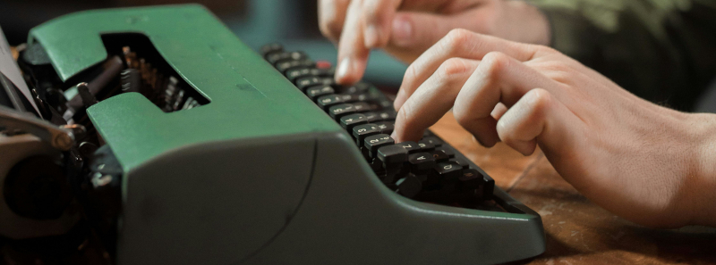 hands on a typewriter